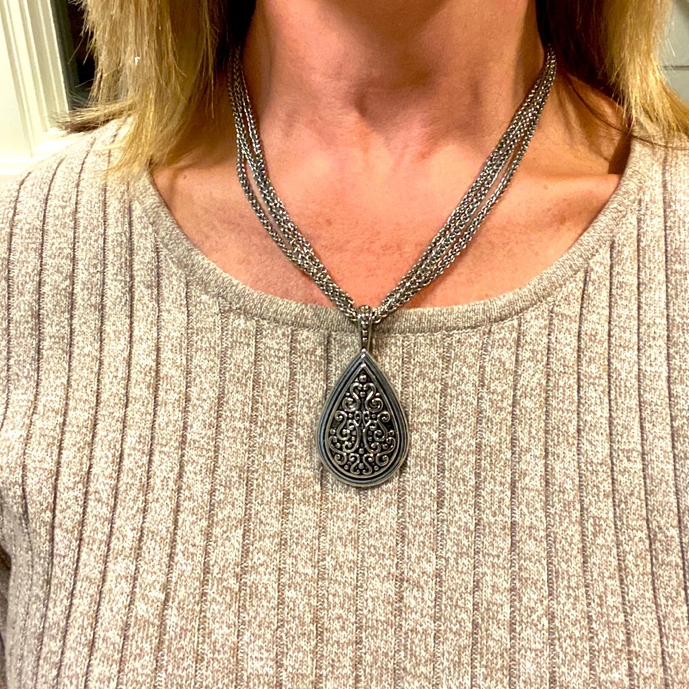 Lia Sophia retired necklace. Makes any simple shirt look beautiful!